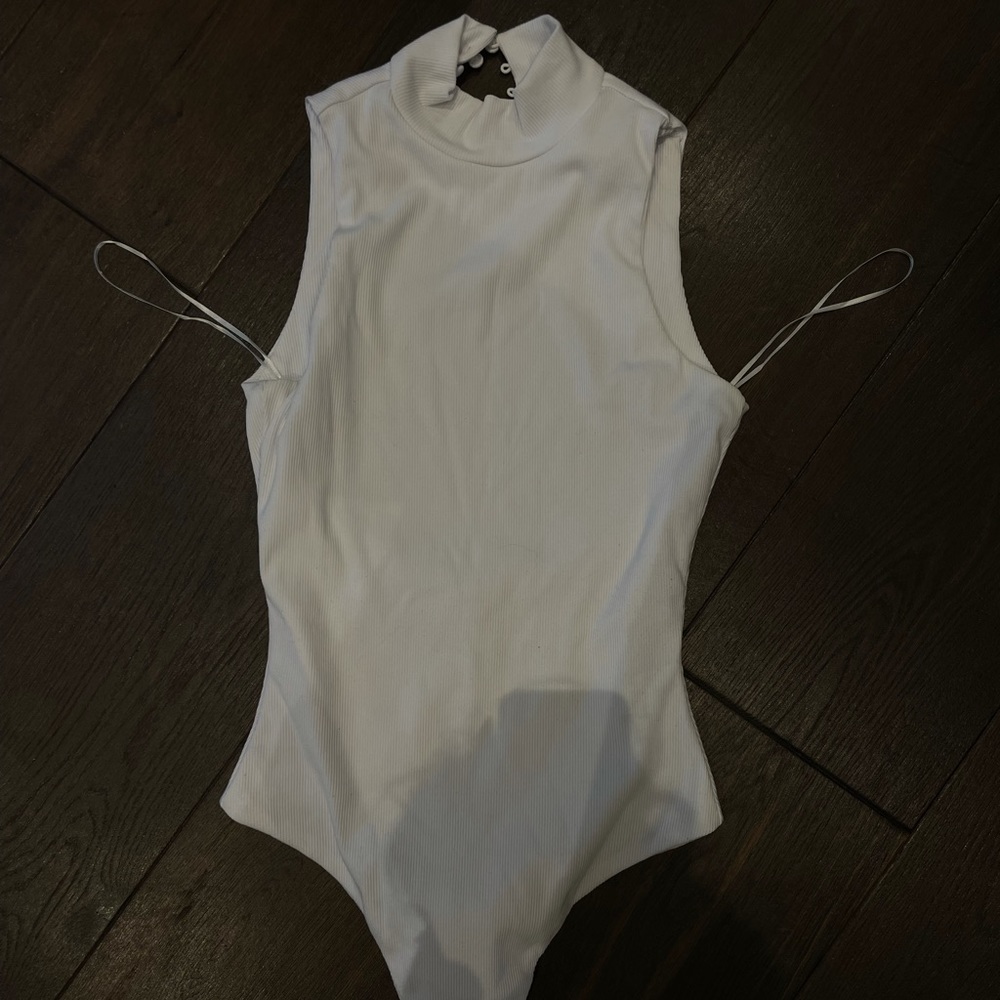 White high neck and open back bodysuit